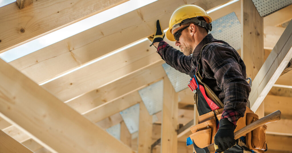 Construction worker framing house