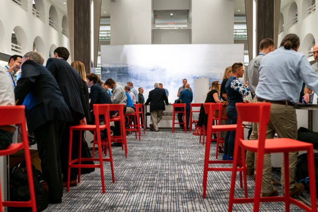 People talking at a conference event