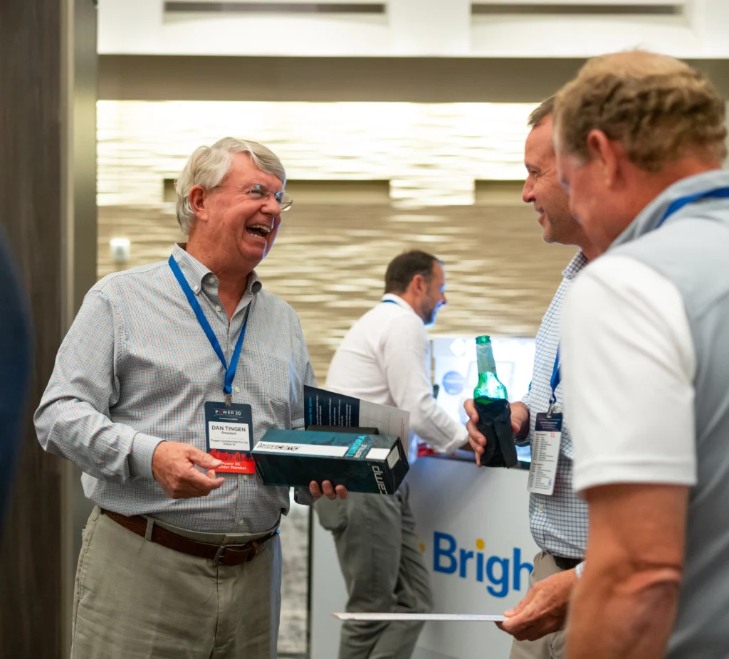 Group of people conversing at a networking event