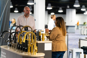Steven Sanders-Myers talking to a supplier