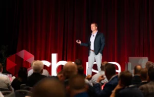 A photo of Brian Pavlick speaking at The Summit by CBUSA