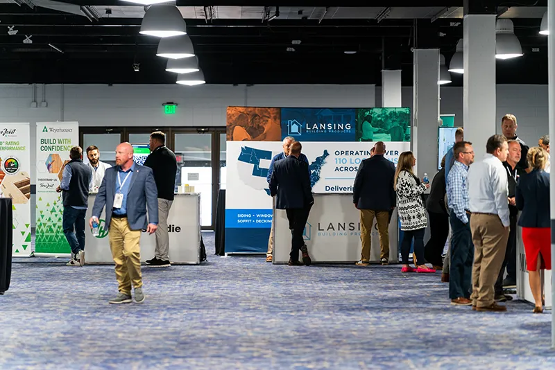 People walking around to booths