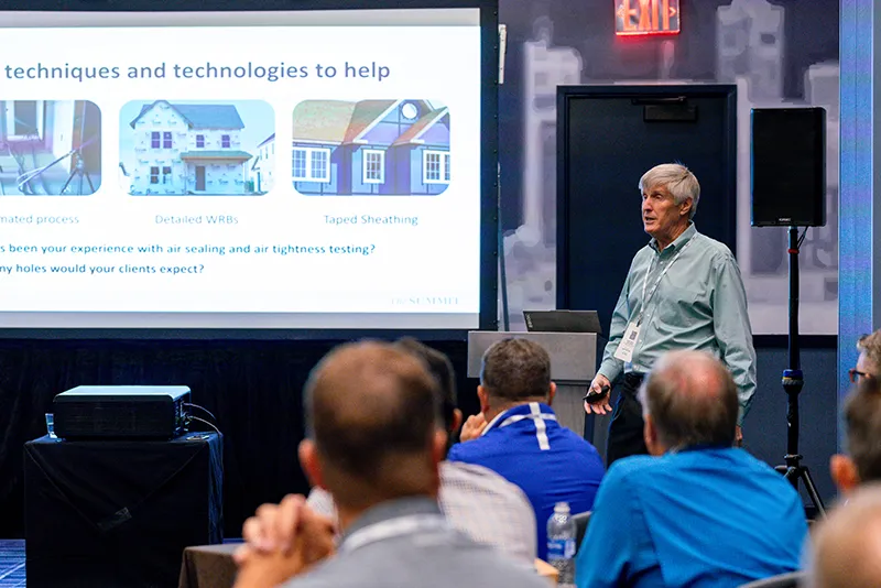 Man presenting slideshow to audience
