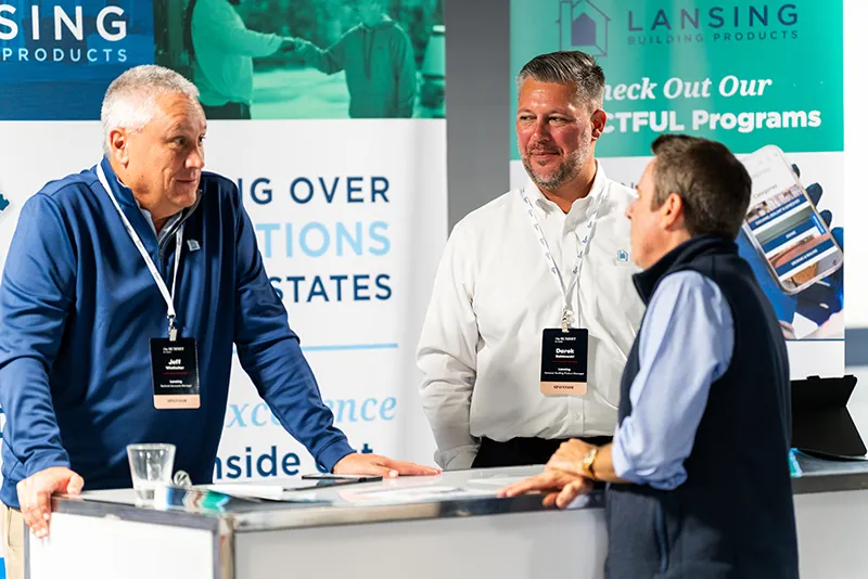 Men having a conversation over counter