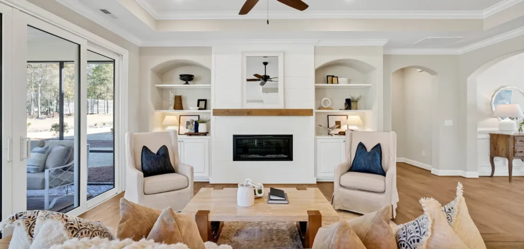 Living room design with arched built-in shelves designed by Kent Homes